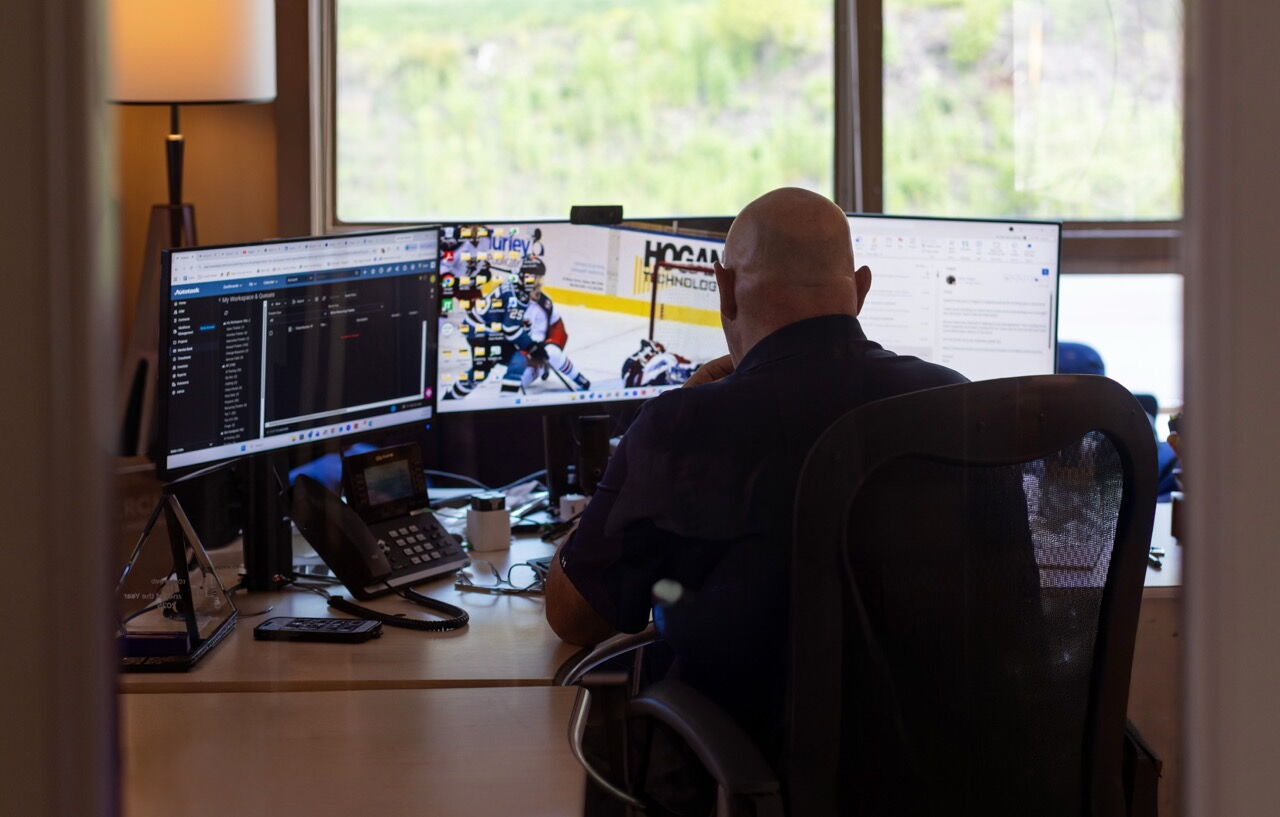 Man Sitting at Computer Desk